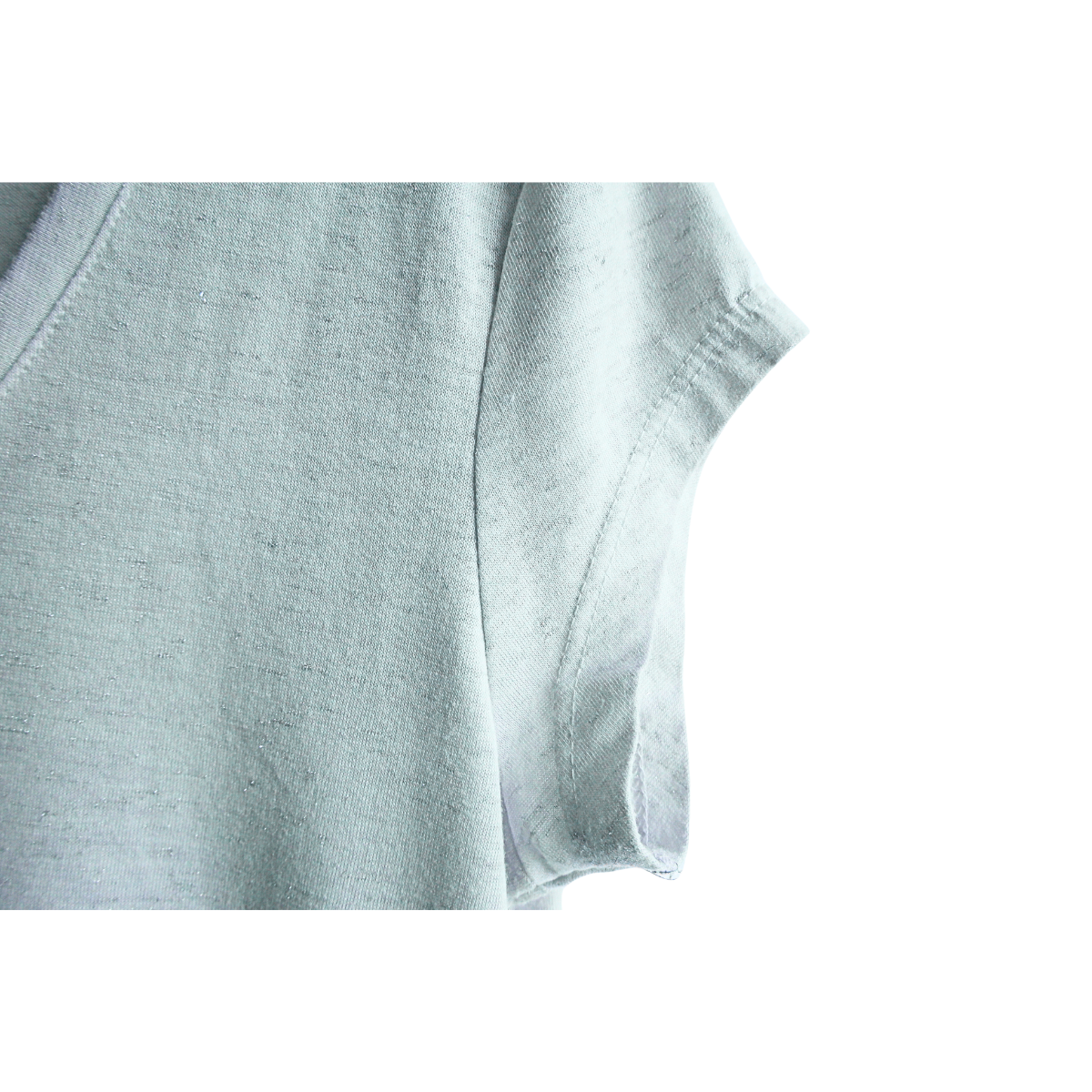 Lichtblauwe shirt met lichte glitter in