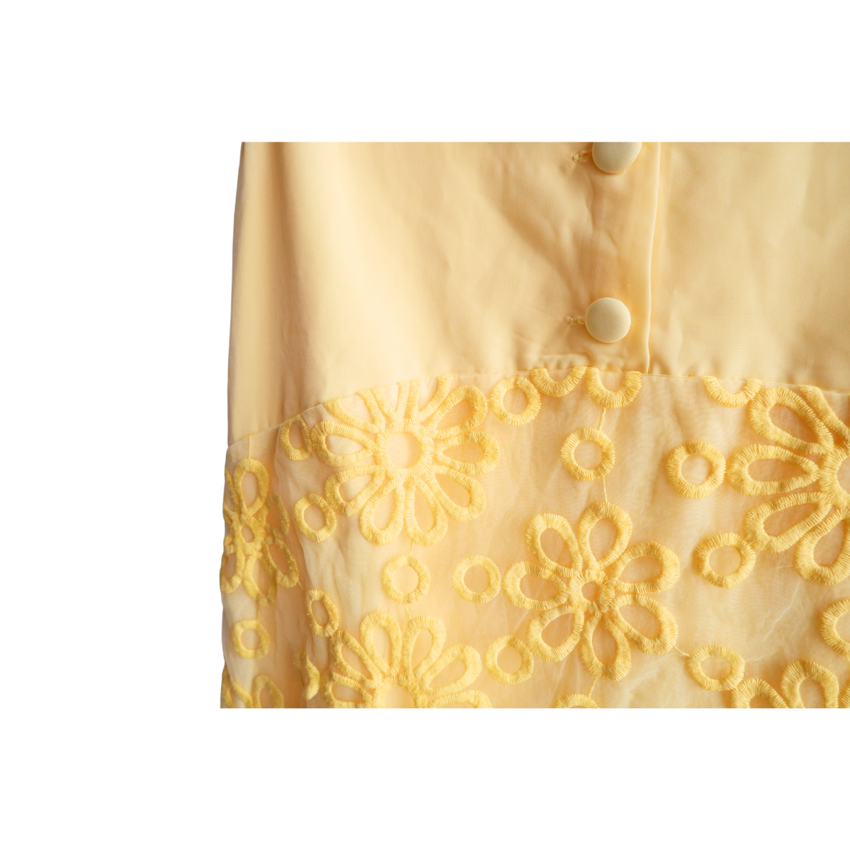 Gele jurk met bloemenpatroon