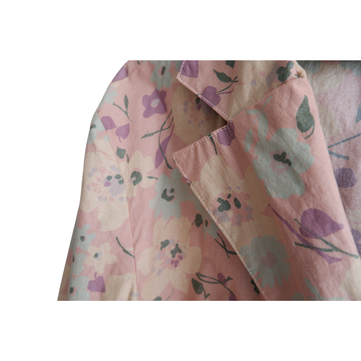 Roze jas met bloemen