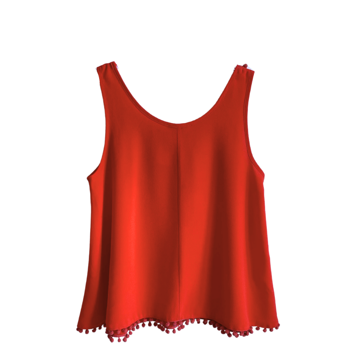 Rode top met pomponnetjes