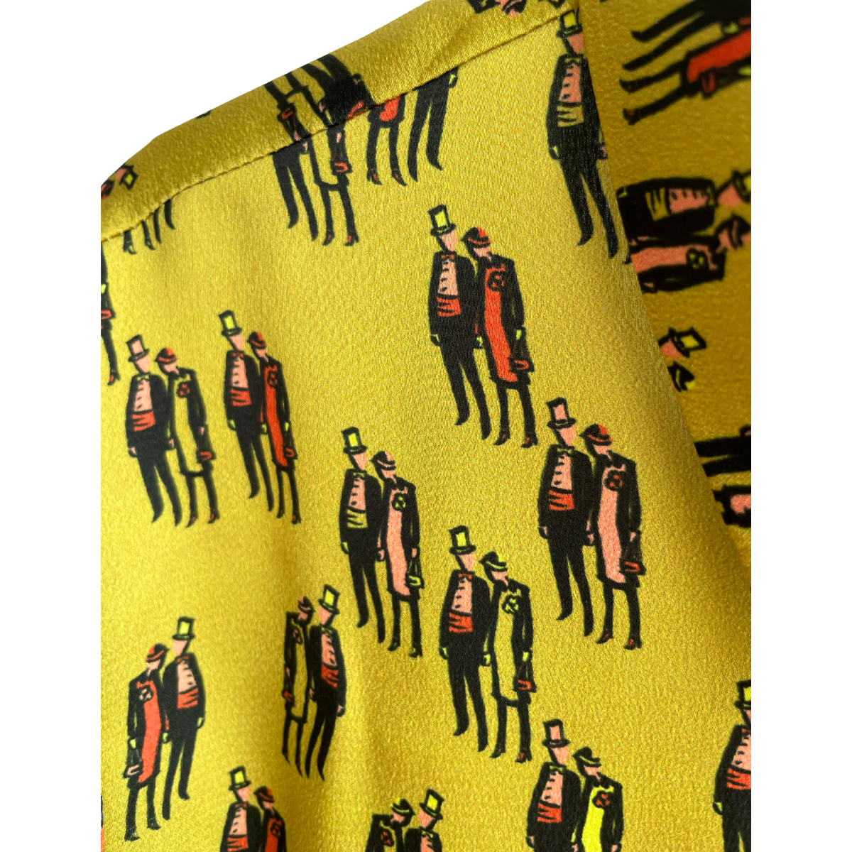 Groengele blouse CKS met mannetjes