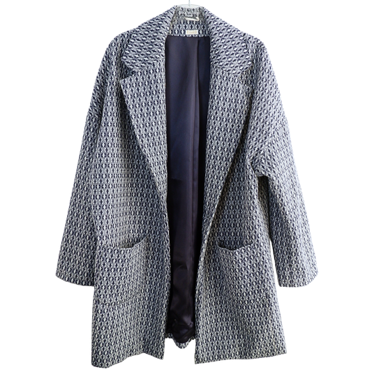 Blauwe zelfgemaakte vest met motief