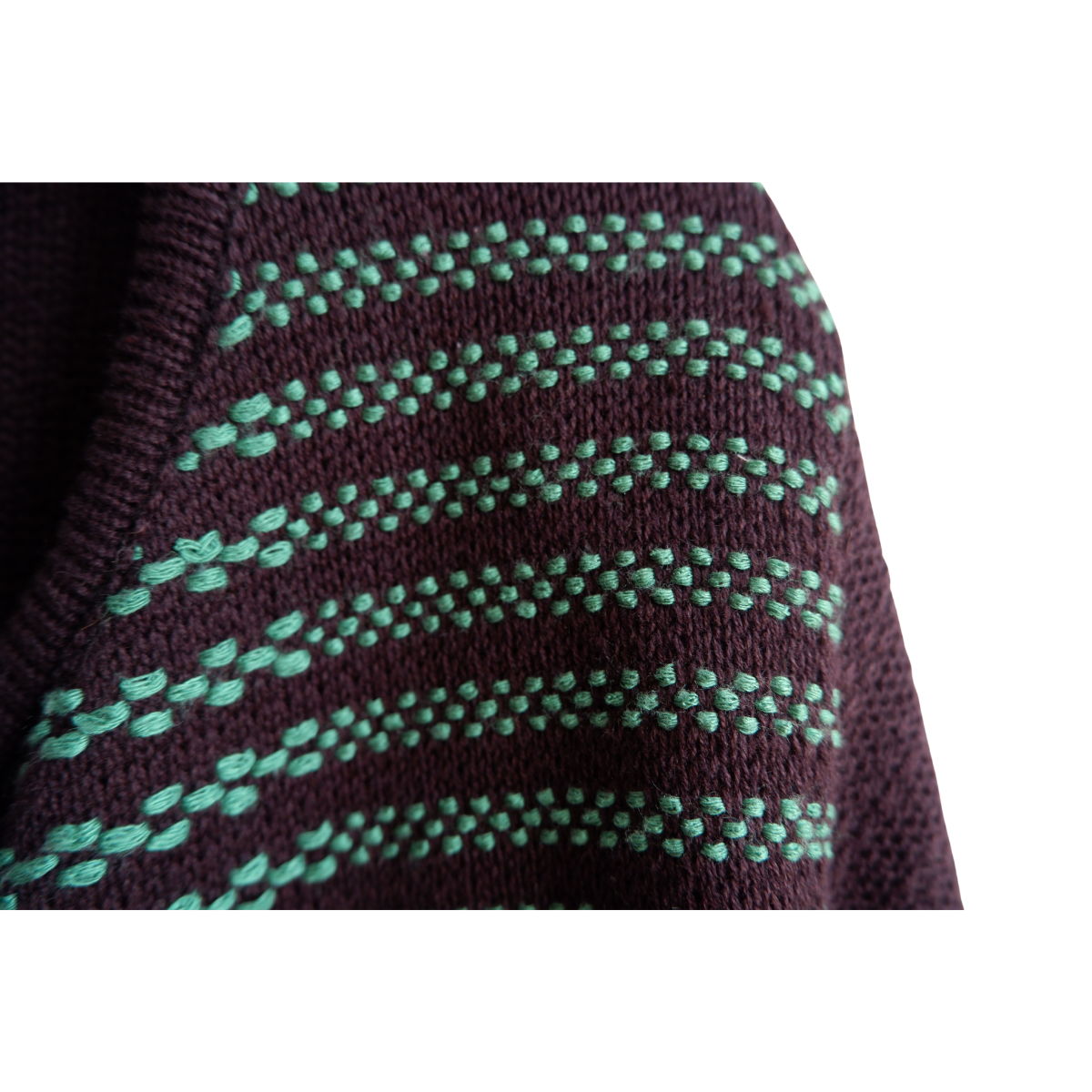 Zwart gilet met groene lijnen