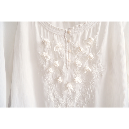 Gebroken witte blouse met bloemen