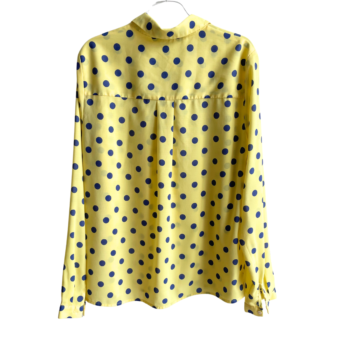 Gele blouse met blauwe bollen