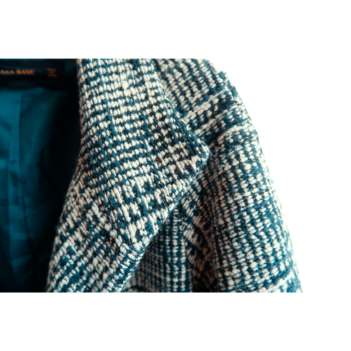 Blauwgroene/witte winterjas