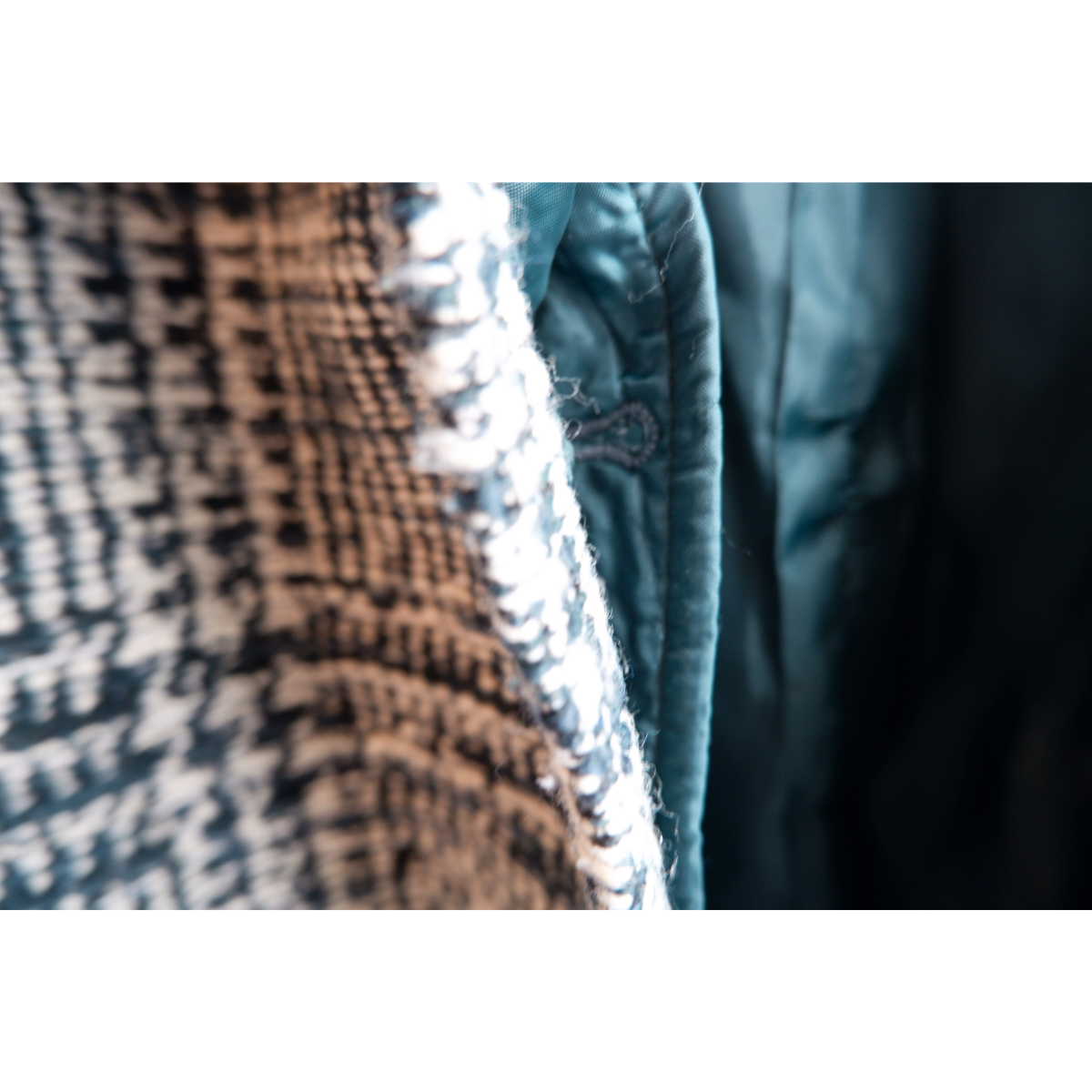 Blauwgroene/witte winterjas