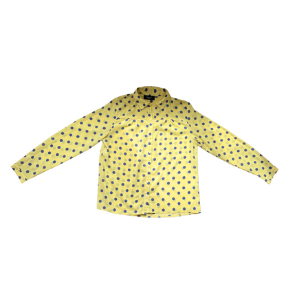 Gele blouse met blauwe bollen