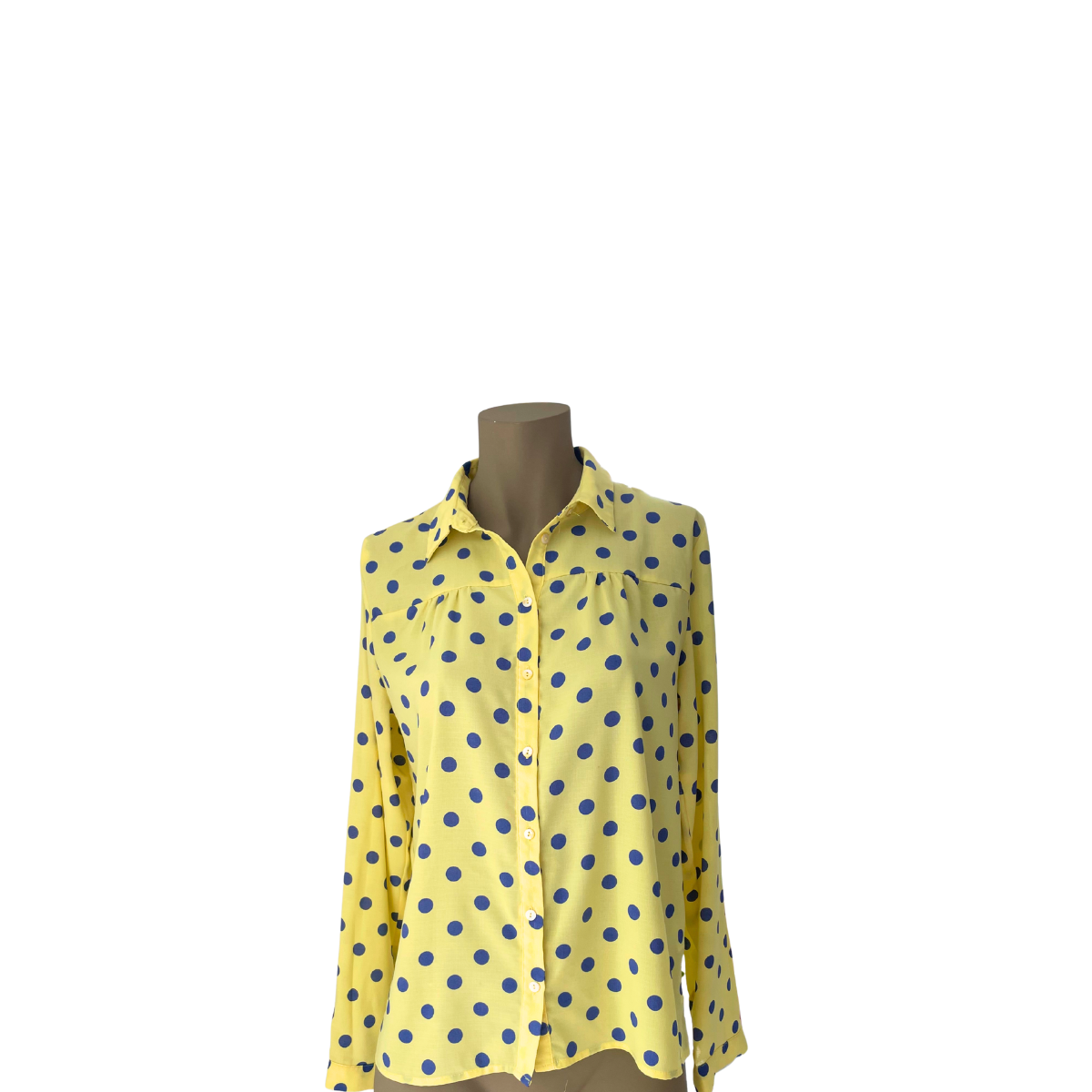 Gele blouse met blauwe bollen