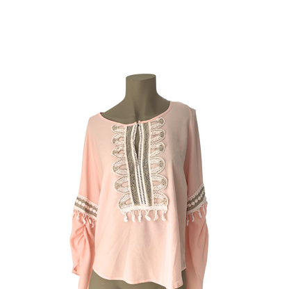 Roze blouse met frivole mouwen